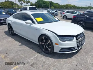 2016 Audi A7 3.0 Prestige with VIN WAU2GAFCXGN102993, listed as a IAAI auction lot 42099259 with 64,490 mi miles. Bid and sale history available at carsss.com. Image 1.