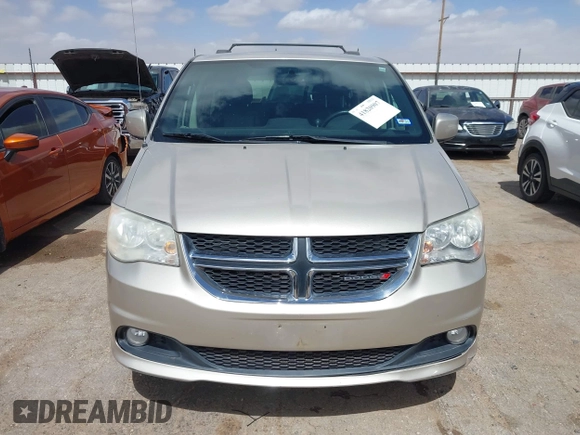 2014 Dodge Grand Caravan SXT with VIN 2C4RDGCG6ER466459, listed as a IAAI auction lot 41820907 with 105,404 mi miles and . Bid and sale history available at DreamBid. Image 11.
