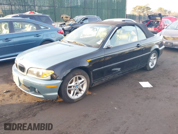2004 BMW 3 Series 325Ci with VIN WBABW33474PG98269, listed as a IAAI auction lot 41457542 with 999,999 mi miles. Bid and sale history available at carsss.com. Image 2.