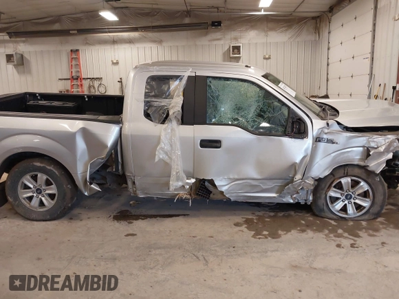 2015 Ford F-150 XLT with VIN 1FTEX1EP1FFD12282, listed as a IAAI auction lot 41743075 with 180,389 mi miles. Bid and sale history available at carsss.com. Image 13.
