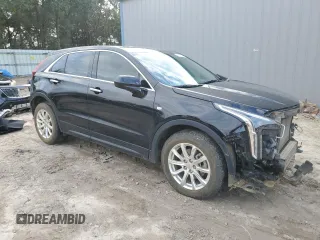 2020 Cadillac XT4 FWD Luxury with VIN 1GYAZAR47LF142704, listed as a Copart auction lot 86730714 with 122,356 mi miles and Salvage Title. Bid and sale history available at DreamBid. Image 4.