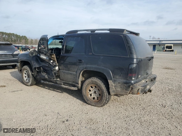 2002 Chevrolet Tahoe LT with VIN 1GNEK13Z02R285658, listed as a Copart auction lot 43216905 with 266,656 mi miles and Salvage Title. Bid and sale history available at carsss.com. Image 2.
