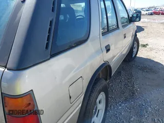 1995 Isuzu Rodeo z VIN 4S2CM58V4S4363500, wystawiony jako IAAI lot #41821801 z przebiegiem 94 480 mil mil oraz . Historia ofert i sprzedaży dostępna na DreamBid. Obrazek 15.