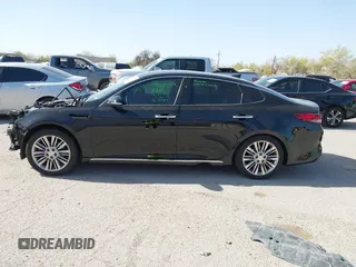 2016 Kia Optima SXL Turbo with VIN 5XXGV4L29GG086468, listed as a IAAI auction lot 41933581 with 186,881 mi miles. Bid and sale history available at carsss.com. Image 15.