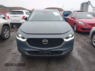 2024 Mazda CX-30 S Carbon Edition z VIN 3MVDMBCM7RM606050, wystawiony jako IAAI lot #41807459 z przebiegiem 7908 mil mil oraz . Historia ofert i sprzedaży dostępna na DreamBid. Obrazek 12.