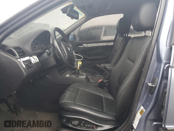 2005 BMW 3 Series 325xi with VIN WBAEU33455PF63005, listed as a Copart auction lot 60960985 with 188,733 mi miles and Salvage title. Bid and sale history available at DreamBid. Image 7.