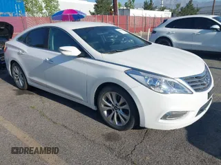 2012 Hyundai Azera with VIN KMHFG4JG5CA152696, listed as a IAAI auction lot 42009308 with 133,068 mi miles. Bid and sale history available at carsss.com. Image 1.