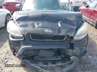 2013 Kia Soul with VIN KNDJT2A5XD7770253, listed as a IAAI auction lot 42012460 with 254,506 mi miles. Bid and sale history available at carsss.com. Image 6.