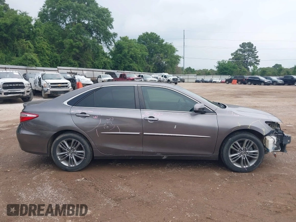 2015 Toyota Camry XLE with VIN 4T1BF1FKXFU891434, listed as a IAAI auction lot 42119108 with 142,736 mi miles and . Bid and sale history available at DreamBid. Image 14.