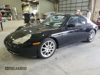 2000 Porsche 911 z VIN WP0CA2990YS650907, wystawiony jako Copart lot #56488095 z przebiegiem 89 026 mil mil oraz Czysty tytuł • Clean title. Historia ofert i sprzedaży dostępna na DreamBid. Obrazek 1.