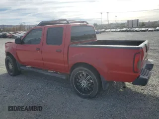 2003 Nissan Frontier XE with VIN 1N6ED27T73C420215, listed as a Copart auction lot 82923734 with 193,468 mi miles and Salvage title. Bid and sale history available at DreamBid. Image 2.