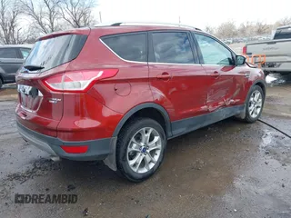 2014 Ford Escape Titanium with VIN 1FMCU9J92EUE01077, listed as a IAAI auction lot 41642337 with 26,002 mi miles. Bid and sale history available at carsss.com. Image 4.