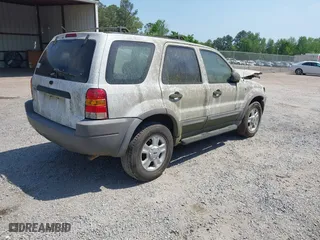 2001 Ford Escape XLT with VIN 1FMYU03171KA35485, listed as a IAAI auction lot 42052581 with 242,653 mi miles. Bid and sale history available at carsss.com. Image 4.
