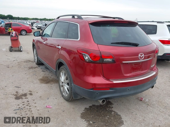 2015 Mazda CX-9 Grand Touring with VIN JM3TB2DA6F0460785, listed as a IAAI auction lot 42474705 with 62,202 mi miles and . Bid and sale history available at DreamBid. Image 3.