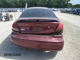 2007 Ford Taurus SE with VIN 1FAFP53U17A151246, listed as a Copart auction lot 60221955 with 284,321 mi miles and Salvage title. Bid and sale history available at DreamBid. Image 6.