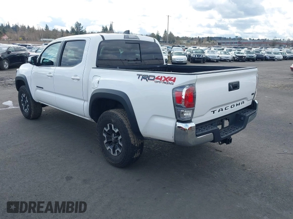 2023 Toyota Tacoma SR z VIN 3TMCZ5AN0PM541700, wystawiony jako IAAI lot #41819408 z przebiegiem 14 216 mil mil oraz . Historia ofert i sprzedaży dostępna na DreamBid. Obrazek 3.