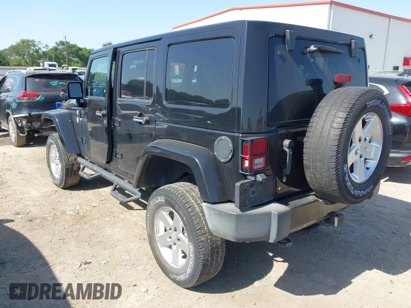 2015 Jeep Wrangler Unlimited Sahara with VIN 1C4BJWEG0FL717536, listed as a IAAI auction lot 42004096 with 90,802 mi miles and . Bid and sale history available at DreamBid. Image 3.