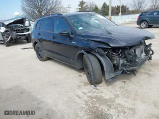 2023 Volkswagen Tiguan SE R-Line Black with VIN 3VV8B7AX4PM019421, listed as a IAAI auction lot 41885691 with 36,332 mi miles. Bid and sale history available at carsss.com. Image 1.