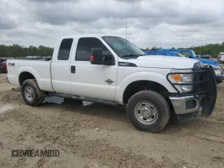 2015 Ford F-250 XLT with VIN 1FT7X2BTXFED40491, listed as a Copart auction lot 54369855 with 233,459 mi miles and Salvage title. Bid and sale history available at DreamBid. Image 4.