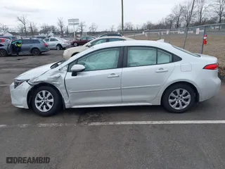 2022 Toyota Corolla LE with VIN JTDEPMAEXN3011631, listed as a IAAI auction lot 41727267 with 64,145 mi miles. Bid and sale history available at carsss.com. Image 13.