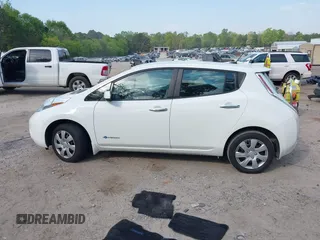 2015 Nissan LEAF SL z VIN 1N4AZ0CP2FC312062, wystawiony jako IAAI lot #42069975 z przebiegiem 250 000 mil mil oraz . Historia ofert i sprzedaży dostępna na DreamBid. Obrazek 14.