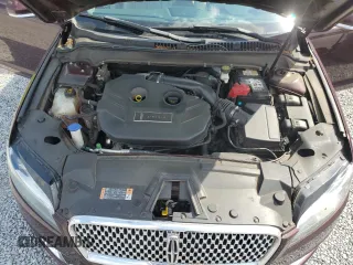 2017 Lincoln MKZ Select z VIN 3LN6L5C97HR649682, wystawiony jako Copart lot #55233965 z przebiegiem 104 727 mil mil oraz Szkoda całkowita • Salvage title. Historia ofert i sprzedaży dostępna na DreamBid. Obrazek 11.