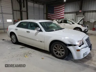 2010 Chrysler 300 with VIN 2C3CA6CT8AH329985, listed as a Copart auction lot 84556624 with 165,348 mi miles and Salvage Title. Bid and sale history available at carsss.com. Image 4.