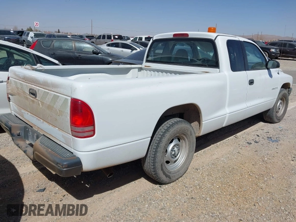2002 Dodge Dakota with VIN 1B7GL12X32S701273, listed as a IAAI auction lot 41552573 with 157,212 mi miles and . Bid and sale history available at carsss.com. Image 4.