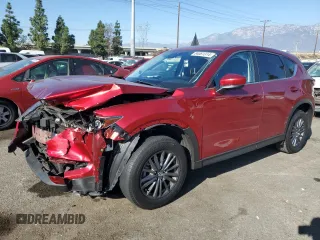 2021 Mazda CX-5 Touring with VIN JM3KFACM8M0369763, listed as a Copart auction lot 84081314 with 54,715 mi miles and Salvage Title. Bid and sale history available at carsss.com. Image 1.