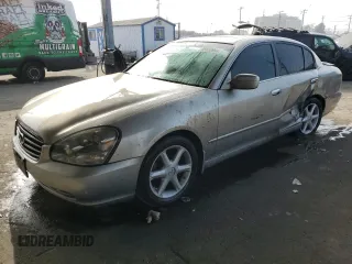 2003 Infiniti Q45 z VIN JNKBF01A03M101890, wystawiony jako Copart lot #86930994 z przebiegiem 158 134 mil mil oraz Szkody całkowita. Historia ofert i sprzedaży dostępna na DreamBid. Obrazek 1.