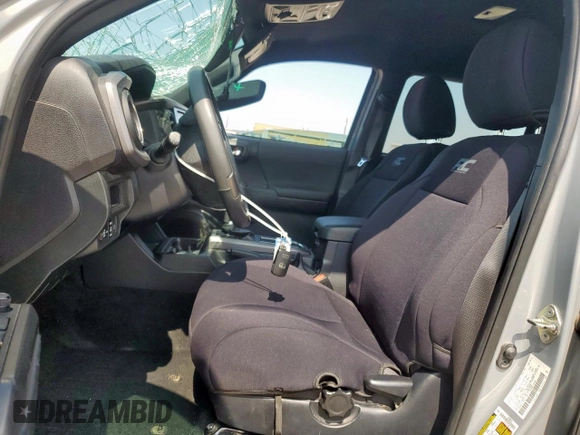 2019 Toyota Tacoma SR z VIN 5TFCZ5AN6KX211952, wystawiony jako Copart lot #58964815 z przebiegiem 97 774 mil mil oraz Szkoda całkowita • Salvage title. Historia ofert i sprzedaży dostępna na DreamBid. Obrazek 7.