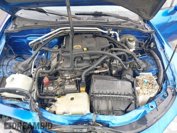 2006 Mazda MX-5 Miata Touring z VIN JM1NC25FX60102209, wystawiony jako IAAI lot #41940771 z przebiegiem 165 003 mil mil oraz . Historia ofert i sprzedaży dostępna na DreamBid. Obrazek 10.