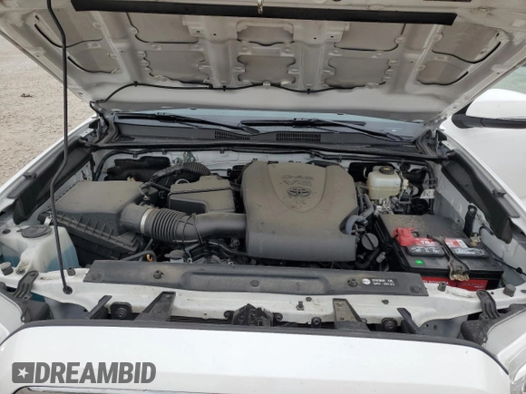 2019 Toyota Tacoma SR z VIN 3TMCZ5AN1KM190613, wystawiony jako Copart lot #57983795 z przebiegiem 41 627 mil mil oraz Szkoda całkowita • Salvage title. Historia ofert i sprzedaży dostępna na DreamBid. Obrazek 11.