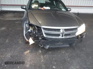 2012 Dodge Avenger SXT z VIN 1C3CDZCBXCN163432, wystawiony jako IAAI lot #39332608 z przebiegiem 169 102 mil mil oraz . Historia ofert i sprzedaży dostępna na DreamBid. Obrazek 6.