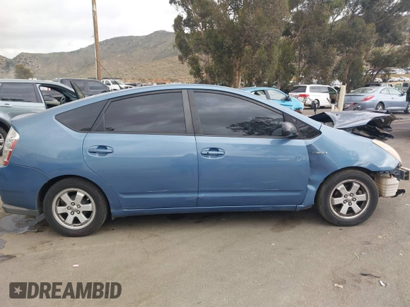 2007 Toyota Prius with VIN JTDKB20U477685445, listed as a IAAI auction lot 42020786 with 243,679 mi miles. Bid and sale history available at carsss.com. Image 13.