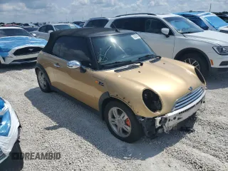 2005 MINI Convertible with VIN WMWRF334X5TG11889, listed as a Copart auction lot 55567995 with 169,717 mi miles and Salvage title. Bid and sale history available at DreamBid. Image 4.