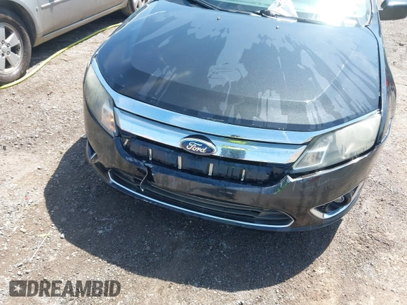 2011 Ford Fusion SE with VIN 3FAHP0HA6BR153888, listed as a IAAI auction lot 42009992 with 213,676 mi miles. Bid and sale history available at carsss.com. Image 6.