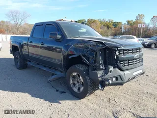 2017 Chevrolet Silverado 1500 LT with VIN 1GCVKREC0HZ293560, listed as a IAAI auction lot 40706331 with 133,438 mi miles. Bid and sale history available at carsss.com. Image 1.