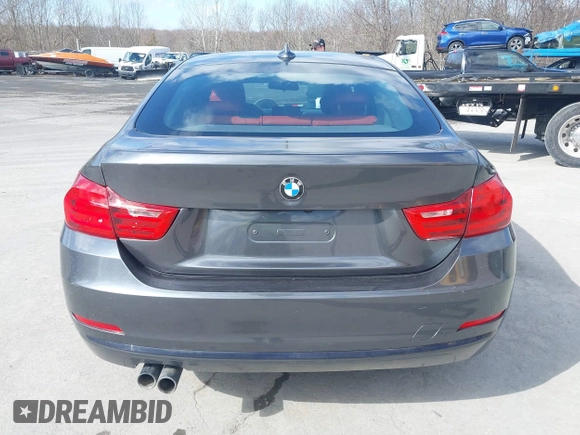 2016 BMW 4 Series 428i xDrive with VIN WBA4C9C56GG140427, listed as a IAAI auction lot 41886670 with 94,426 mi miles and . Bid and sale history available at carsss.com. Image 16.