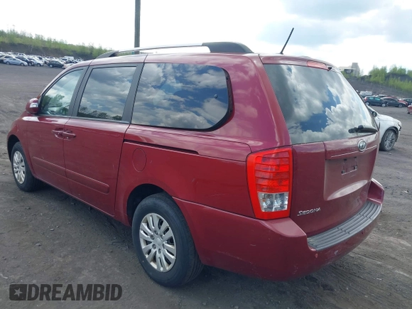 2012 Kia Sedona LX with VIN KNDMG4C76C6453523, listed as a IAAI auction lot 42189376 with 207,557 mi miles. Bid and sale history available at carsss.com. Image 3.