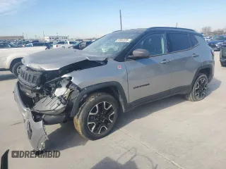 2020 Jeep Compass Trailhawk z VIN 3C4NJDDB0LT207825, wystawiony jako Copart lot #87641335 z przebiegiem Nie podano mil oraz Szkoda całkowita • Salvage title. Historia ofert i sprzedaży dostępna na DreamBid. Obrazek 1.