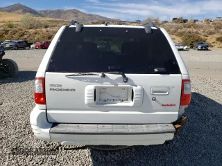 2001 Isuzu Rodeo S with VIN 4S2DM58W614343261, listed as a Copart auction lot 75365974 with Not Provided miles and Clean Title. Bid and sale history available at DreamBid. Image 6.