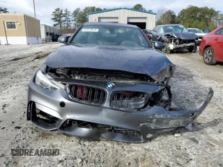 2015 BMW M4 with VIN WBS3R9C56FK330505, listed as a Copart auction lot 37317014 with 54,483 mi miles. Bid and sale history available at carsss.com. Image 5.