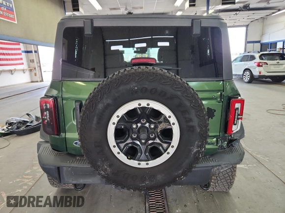 2023 Ford Bronco z VIN 1FMEE5DP9PLB54433, wystawiony jako Copart lot #60074335 z przebiegiem 23 709 mil mil oraz Szkoda całkowita • Salvage title. Historia ofert i sprzedaży dostępna na DreamBid. Obrazek 6.
