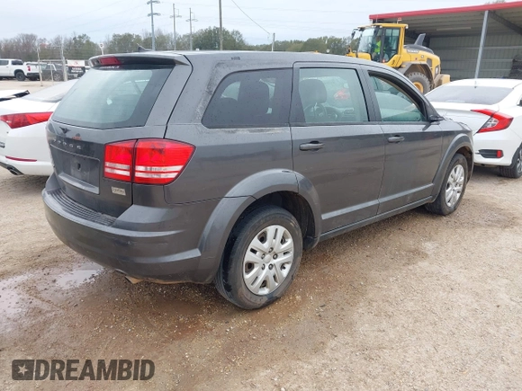 2014 Dodge Journey American Value Pkg with VIN 3C4PDCAB7ET247286, listed as a IAAI auction lot 41214056 with 205,222 mi miles. Bid and sale history available at carsss.com. Image 4.