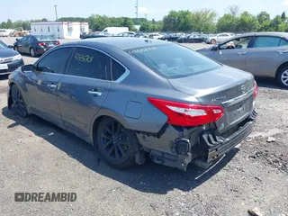 2016 Nissan Altima SR with VIN 1N4AL3AP1GC204037, listed as a IAAI auction lot 42558701 with 82,002 mi miles and . Bid and sale history available at DreamBid. Image 3.