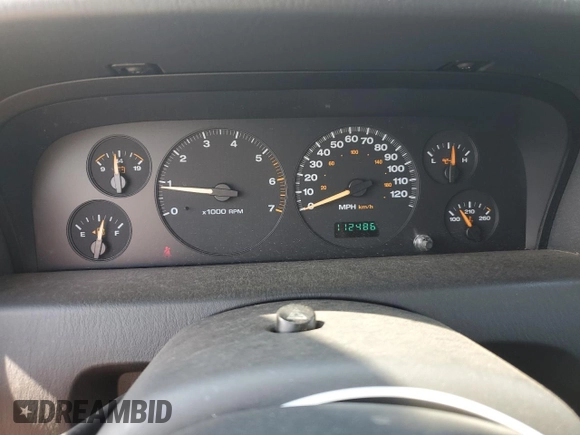 2004 Jeep Grand Cherokee Laredo with VIN 1J4GW48S44C282992, listed as a Copart auction lot 61523685 with 112,486 mi miles and Clean title. Bid and sale history available at DreamBid. Image 9.