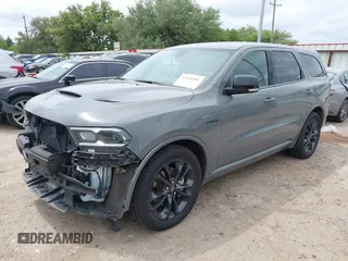 2022 Dodge Durango R/T с VIN 1C4SDJCT1NC221105, выставлен на аукционе IAAI как лот 42146801 с пробегом 61 373 миль миль и . История ставок и продаж доступна на DreamBid. Изображение 2.