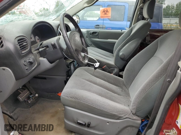 2005 Dodge Caravan SXT with VIN 2D4GP44L05R480918, listed as a Copart auction lot 58523645 with 212,535 mi miles and Salvage title. Bid and sale history available at DreamBid. Image 7.