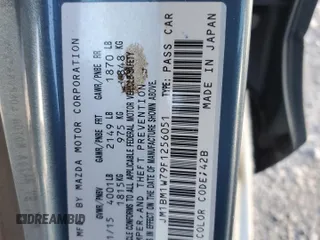 2015 Mazda 3 i Grand Touring with VIN JM1BM1W79F1256051, listed as a Copart auction lot 47898525 with 181,390 mi miles and Salvage Title. Bid and sale history available at DreamBid. Image 15.